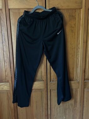 Nike Black Athletic Pants with White Swoosh Logo